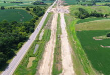 Innovating Stormwater Management in Linear Construction 1. Aerial image of U.S. 30 Highway construction in Tama County, Iowa, USA, that shows the existing two-lane route and the adjacent expansion, which includes four travel lanes, a median and shoulders.