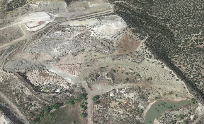 Quarry 1 before reclamation was a steep, highly visible and severely eroded limestone quarry with exposed rock faces and minimal vegetation.