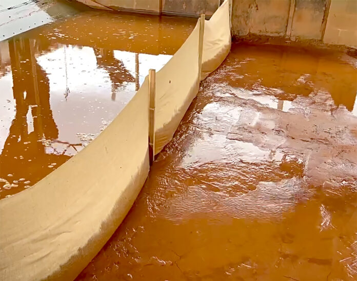 Fig. 1: Made with natural fibers, TerraTex Bio Fence breaks down and composts to reduce site waste. Photo Credit: Hanes Geo Components