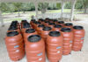 Bringing Conservation to the Community Fig. 1: Fifty-five-gallon rain barrels were provided free of charge to 115 workshop attendees. Photo credit: AU-SRF